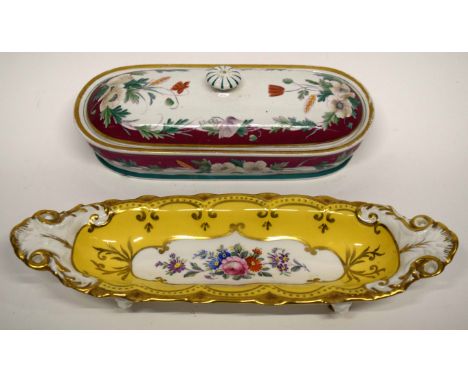 19th century English porcelain pen tray, the yellow ground with a panel of floral sprays supported on four lion mask feet, to