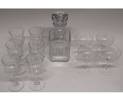 Baccarat cut glass decanter and stopper together with six wine glasses and four dessert glasses with engraved floral design (