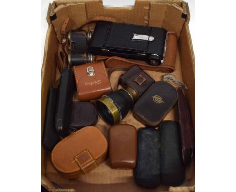 Box containing assorted camera accessories