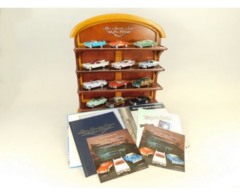 FRANKLIN MINT. 'Classic Cars of the Fifties': Twelve 1;43 scale models with display shelf. Original folder with certificates,