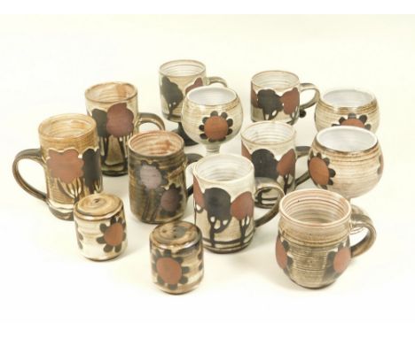 BRIGLIN. Eleven various shape &amp; pattern mugs &amp; a salt &amp; pepper pot by Briglin Pottery.