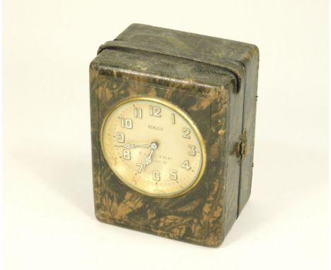 SOLUS CLOCK. A Solus Brevet electric travel clock in leatherette case.