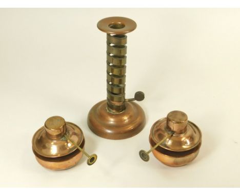 COPPER WARE. A Cornish copper ware candlestick by Laurence Butler & two copper & brass spirit burners. 