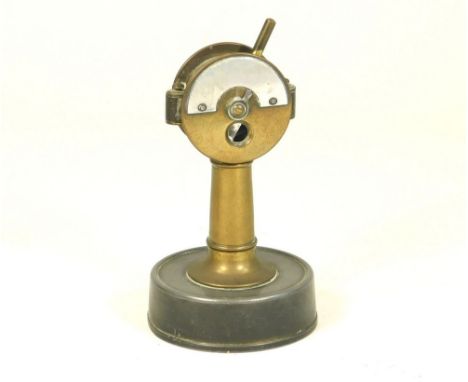 CIGAR CUTTER. An early 20th century brass & tin cigar cutter in the form of a ship's engine room telegraph. Height 12cm.