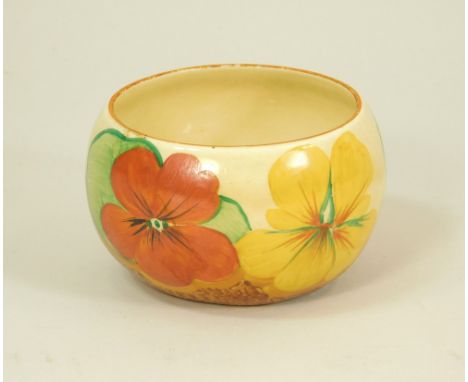 CLARICE CLIFF. A Clarice Cliff, Newport Pottery, Bizarre sugar bowl in the Nasturtium pattern.