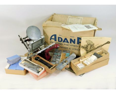 ADANA PRINTING MACHINE.A 1960s Adana 'Five-Three Home Printing Machine' complete with a wooden box of type, various accessori
