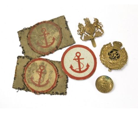 WWII MILITARY BADGES ETC.Three Beach Formation Group cloth badges, two soiled on khaki patches, a Royal Engineers cap badge, 