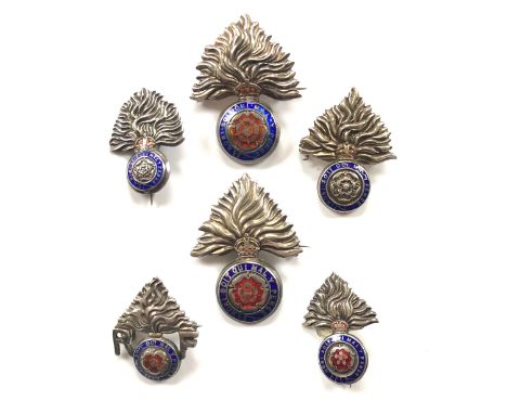 Royal Fusiliers Silver Regimental Sweetheart BroochesSix silver and enamel examples depicting the Regimental device. All comp
