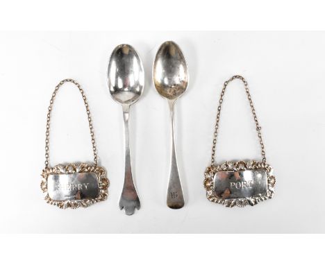 A pair of hallmarked silver George III teaspoons with engraved initials to the terminals. The first being assay marked for Sh