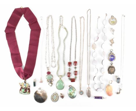 A collection of vintage silver jewellery. The lot to include two shell pendants, two obelisk crystal pendants, five faceted s