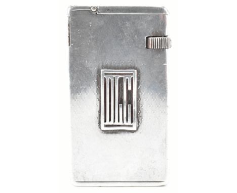 A mid 20th century 1940s hallmarked silver Dunhill lighter. The lighter of rectangular form appears with custom initials (DLC