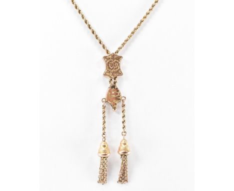 A 19th Century Victorian 9ct gold pocket watch chain necklace. The necklace having a rope twist chain with sliding armorial c