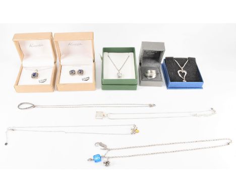 A collection of silver jewellery to include a silver snake chain necklace with pendant set with white stones, a a silver hear