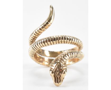 A hallmarked 9ct gold snake serpent ring. The ring in the form of a coiled snake with moulded details. Hallmarked Birmingham.