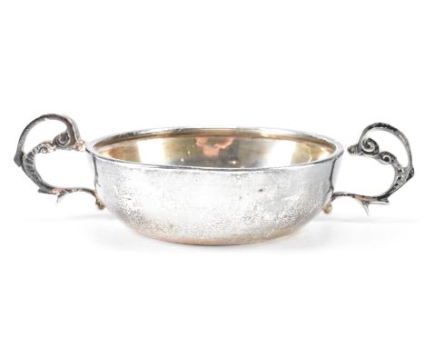 An Edward Viner's silver hallmarked twin handled christening cup / bowl together with silver and mother of pearl toasting for