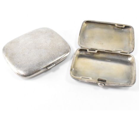 A pair of silver hallmarked cigarette cases. The cases of square form, the first with no additional decoration, hallmarked as
