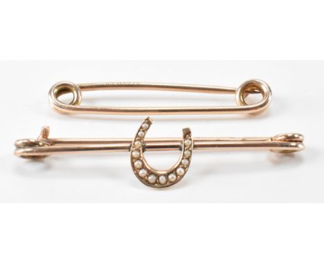 Two 9ct gold safety pin brooches. The lot to include an antique 9ct gold safety pin brooch. The brooch having an applied hors
