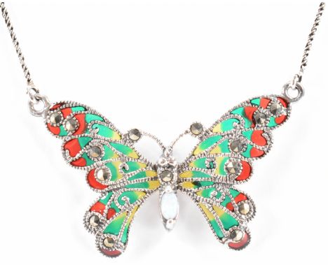 A silver plique a jour opal and marcasite set butterfly pendant chain necklace. The butterfly having a synthetic opal to body