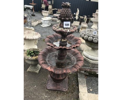 A pre-cast bronze effect garden water feature with pineapple finial, approx. 130cm