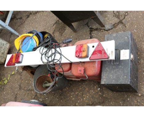 A quantity of petrol cans, two containers of tools etc.