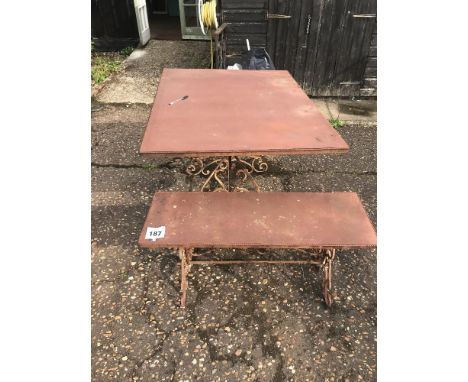 A cast iron table and bench, approx. 75cm