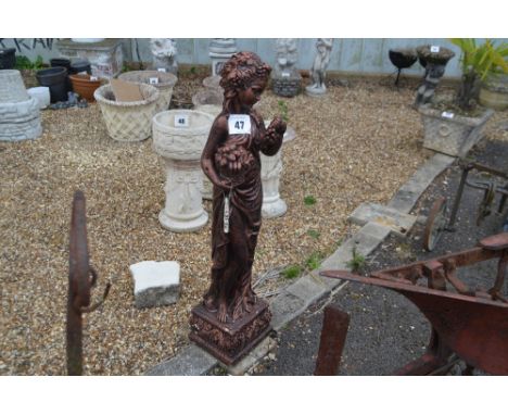 A bronze effect pre-cast statue in the form of a child, approx. 115cm