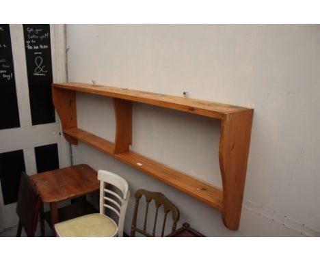 A stripped pine hanging wall shelf, an oak tea trolley, a metal trunk, two tier occasional table, another similar, a rush sea