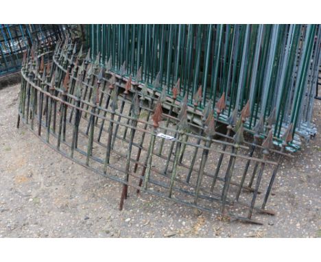 A decorative wrought  iron semi circle balcony railing, approx. 53cm plus ground mounting