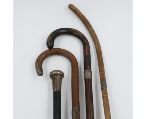 Four mixed walking sticks with silver mounts. UK P&amp;P Group 3 (£30+VAT for the first lot and £8+VAT for subsequent lots) 