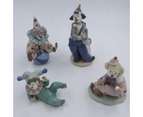 Four Nao clown figurines, largest H: 19 cm, no chips or cracks. UK P&amp;P Group 3 (£30+VAT for the first lot and £8+VAT for 