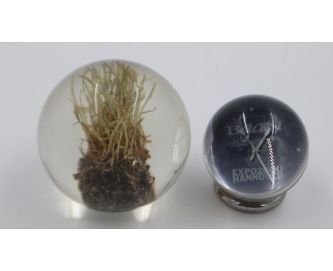 Expo 2000 Hannover clock and a Wembley 2000 End Of An Era paperweight. UK P&amp;P Group 1 (£16+VAT for the first lot and £2+V