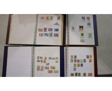 Two albums of Hungarian and two albums of Romanian stamps. UK P&amp;P Group 2 (£20+VAT for the first lot and £4+VAT for subse