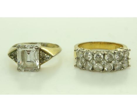 Two 925 silver gilt rings with clear stones, 9.3g. UK P&amp;P Group 1 (£16+VAT for the first lot and £2+VAT for subsequent lo