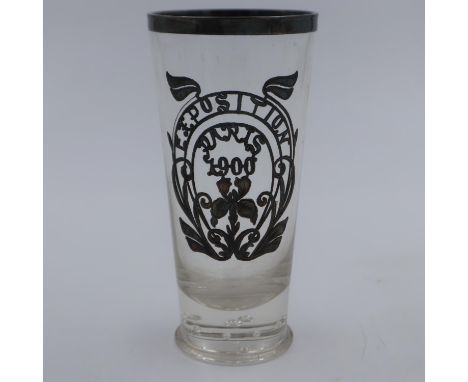 White metal bound drinking glass for the 1900 Paris Exposition. H: 16cm. UK P&amp;P Group 2 (£20+VAT for the first lot and £4