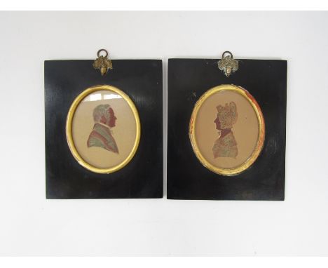 A pair of pastel portrait miniatures of a lady and a gentleman. 10.5cm x 8.5cm  