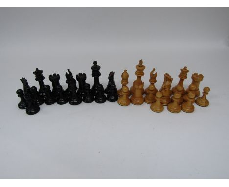 An English weighted boxwood chess set, 32 pieces (complete), in the original box. C.1910