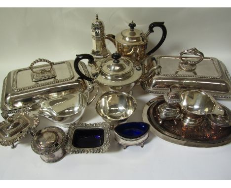 A quantity of electroplated wares including four piece tea service, two entree dishes, mazarins, sauce boats and condiments.