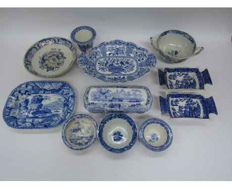 A collection of early 19thC blue and white transfer printed items including a toilet box and cover with oriental scene, a pla