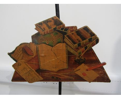 A Regency pole screen with a shaped face screen containing a fascinating perspective rendering of a cluttered desk top with a