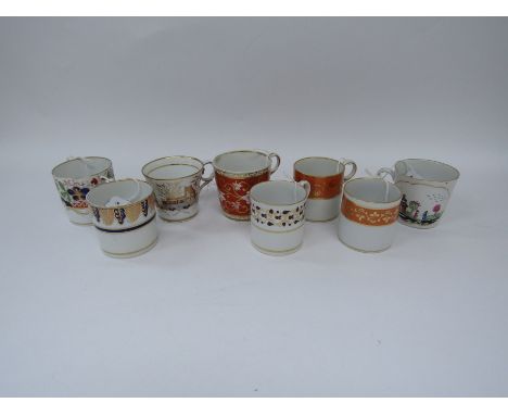 A Worcester Barr Flight &amp; Barr coffee can, gilt scrolling pattern on orange ground between gilt bands, two further exampl