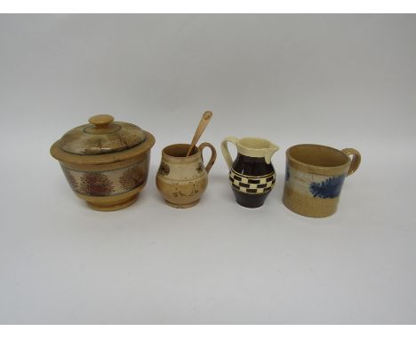 Three items of 19th century Mocha ware with a biscuit base including a lidded sugar bowl, a small cylindrical mug, a barrel-s