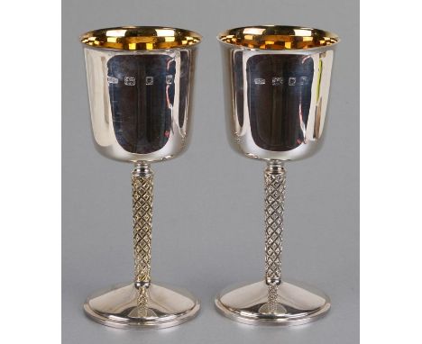 A pair of silver gilt goblets, weight 490g, London 1971, 17cms (6.6ins) high (2).Condition ReportBoth in good overall conditi