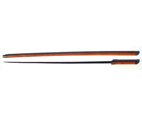 A Victorian Malacca swordstick with blue steel blade, the blade length 63cms (24.5ins) long, overall length 93cms (36.5ins).