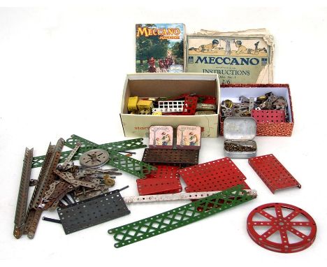 A large quantity of vintage Meccano to include girders, wheels, clockwork motor and other items.