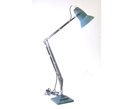 A Herbert Terry anglepoise lamp on a three step square base