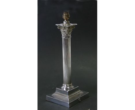 An early 20th century silver plated Corinthian column table lamp on a square stepped base, needs rewiring, 42 cms (16.5 ins) 