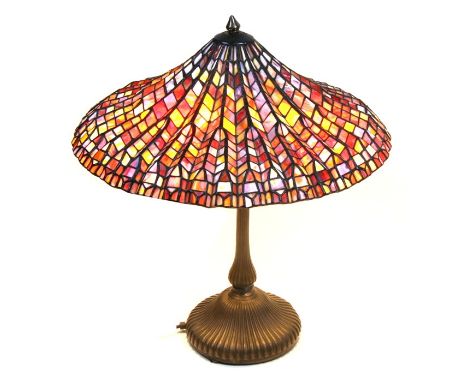 A Tiffany style table lamp. 51cm (20 ins) high (a/f)Condition Reportthe shade is detached from the lamp base