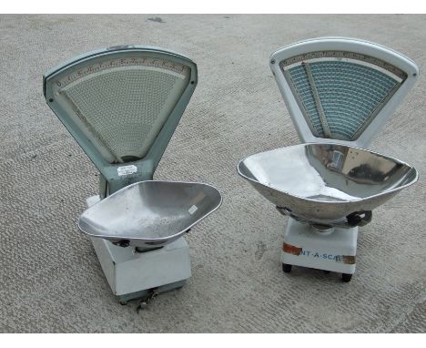 Two shop counter scales; together with a wicker shopping trolley and wicker basket (4).