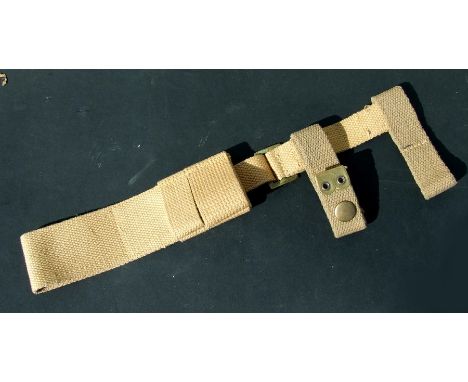 An unissued 08 Pattern bayonet frog with helve strap and carrier. Marked to the reverse of the frog with the War Department a