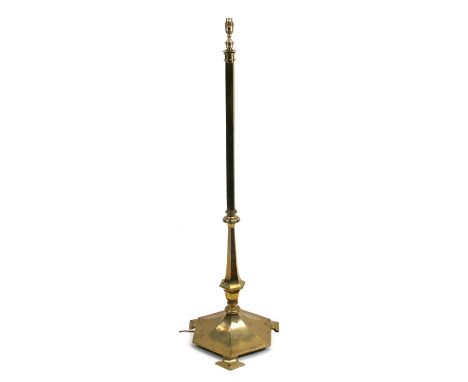 An Arts &amp; Crafts brass telescopic standard lamp.